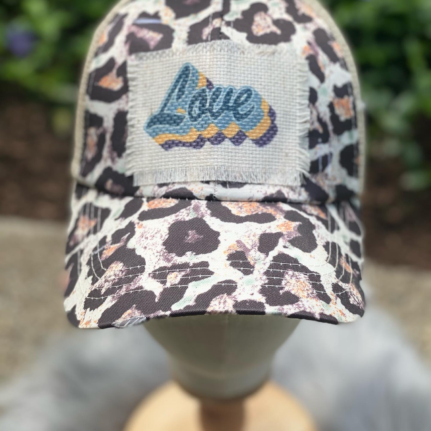 Hat with Frayed Fabric Patch